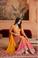 Exquisite Orange and Pink Sharara Suit with Intricate Detailing sitting view